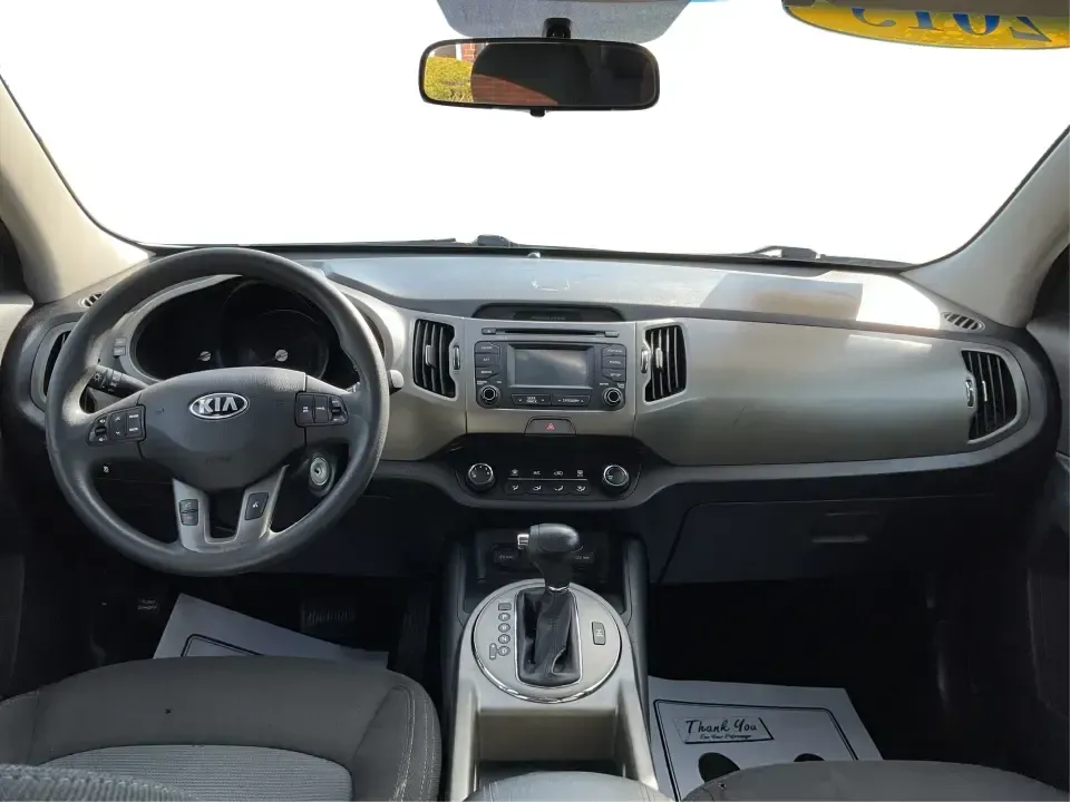 2015 Kia Sportage LX (KNDPBCAC2F7) with an 2.4L V6 DOHC 24V engine, 6-Speed Automatic transmission, located at 1099 N County Rd 25A, Troy, OH, 45373, (937) 908-9800, 40.057079, -84.212883 - Are you ready to elevate your driving experience and embark on unforgettable adventures? Look no further than this 2015 Kia Sportage LX, perfect for those who crave a reliable crossover that blends style with versatility. Whether you're commuting to work, shuttling the kids to school, or planning a - Photo#19