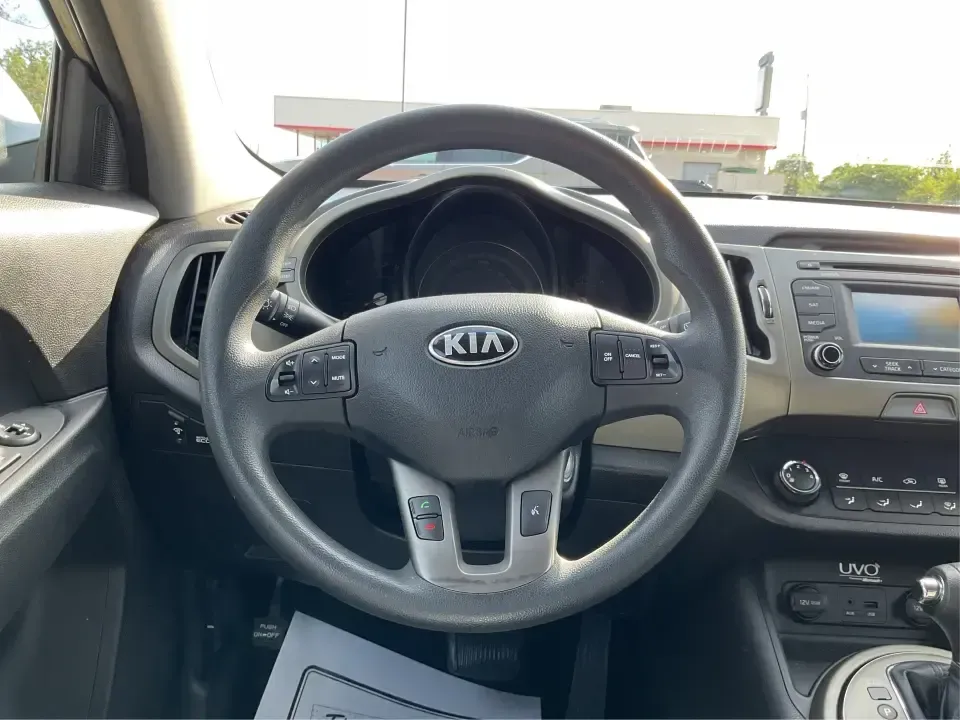 2015 Kia Sportage LX (KNDPBCAC2F7) with an 2.4L V6 DOHC 24V engine, 6-Speed Automatic transmission, located at 4508 South Dixie Dr, Moraine, OH, 45439, (937) 908-9800, 39.689976, -84.218452 - Are you ready to elevate your driving experience and embark on unforgettable adventures? Look no further than this 2015 Kia Sportage LX, perfect for those who crave a reliable crossover that blends style with versatility. Whether you're commuting to work, shuttling the kids to school, or planning a - Photo#16