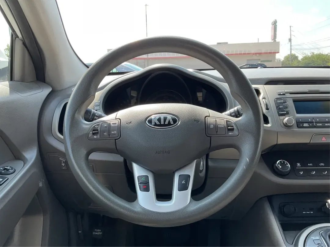 2013 Kia Sportage LX (KNDPBCA26D7) with an 2.4L I-4 DOHC engine, located at 8750 N County Rd 25A, Piqua, OH, 45356, (937) 908-9800, 40.164391, -84.232513 - Experience the ultimate blend of versatility and comfort with this 2013 Kia Sportage LX, perfect for families on the go, urban commuters, or those planning outdoor weekend adventures. This reliable crossover's spacious interior and dynamic performance make it an ideal choice for drivers seeking a de - Photo#15