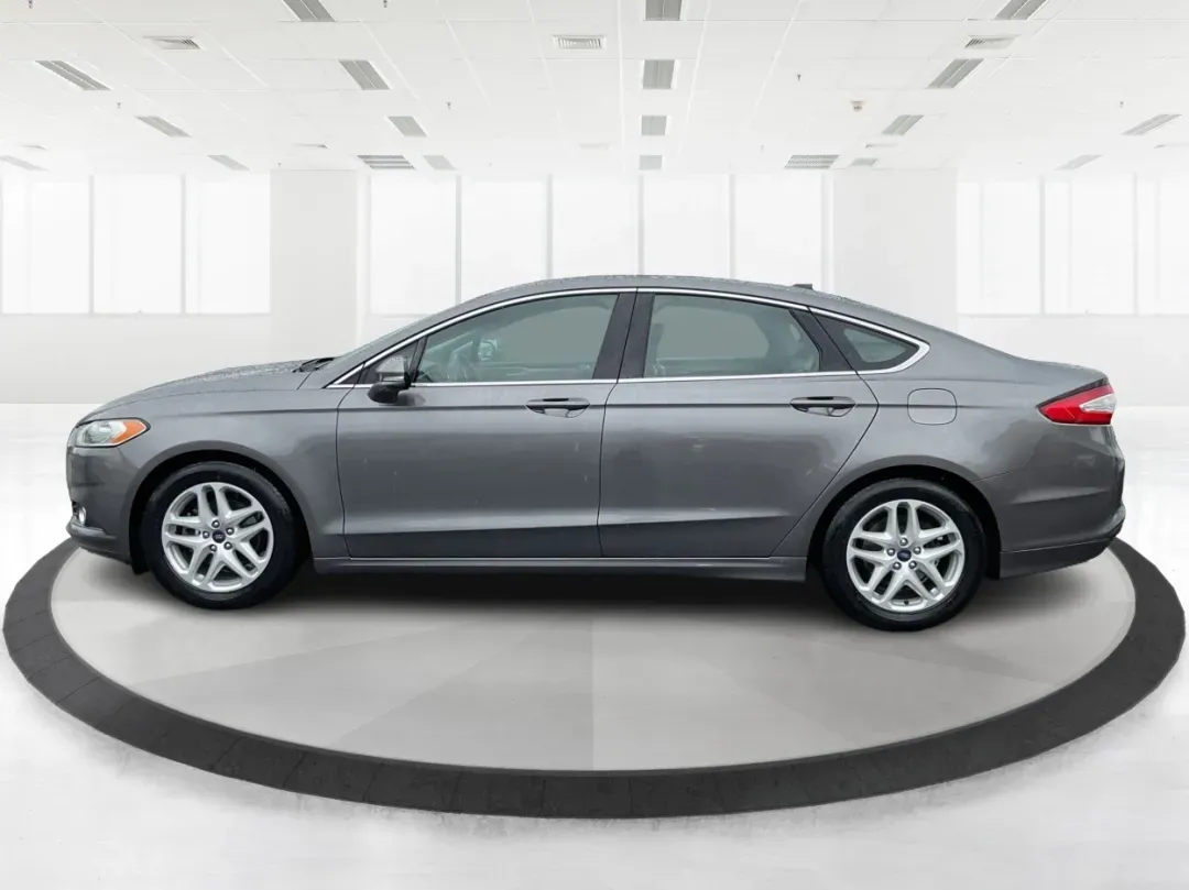 2014 Ford Fusion SE (3FA6P0HD2ER) with an Other engine, located at 1099 N County Rd 25A, Troy, OH, 45373, (937) 908-9800, 40.057079, -84.212883 - **Discover Your Next Adventure with the 2014 Ford Fusion SE at Advantage Car and Credit - Moraine** <br /> <br /> Are you ready to elevate your daily commute or family road trips? The 2014 Ford Fusion SE is your gateway to a lifestyle brimming with comfort, technology, and reliability. Ideal for bu - Photo#5