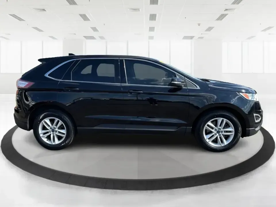 2017 Ford Edge SEL AWD (2FMPK4J9XHB) with an 2.0L L4 DOHC 16V engine, 6A transmission, located at 1099 N County Rd 25A, Troy, OH, 45373, (937) 908-9800, 40.057079, -84.212883 - Need an SUV that can handle Ohio's changing seasons, daily school runs, and spontaneous weekend getaways without feeling bulky? This **2017 Ford Edge SEL AWD** is built for real life in and around **Troy, Ohio**-the kind of vehicle that's equally at home cruising up **I75**, navigating **SR55/SR41**- Photo#1