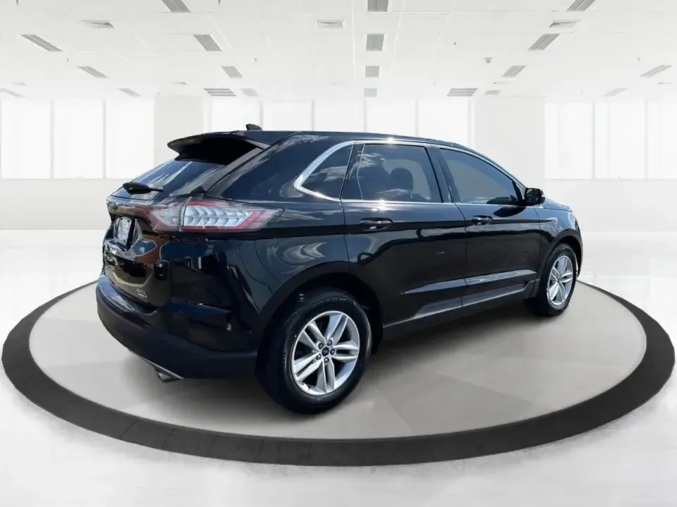 2017 Ford Edge SEL AWD (2FMPK4J9XHB) with an 2.0L L4 DOHC 16V engine, 6A transmission, located at 1099 N County Rd 25A, Troy, OH, 45373, (937) 908-9800, 40.057079, -84.212883 - Need an SUV that can handle Ohio's changing seasons, daily school runs, and spontaneous weekend getaways without feeling bulky? This **2017 Ford Edge SEL AWD** is built for real life in and around **Troy, Ohio**-the kind of vehicle that's equally at home cruising up **I75**, navigating **SR55/SR41**- Photo#2