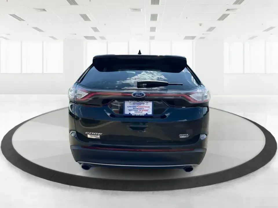 2017 Ford Edge SEL AWD (2FMPK4J9XHB) with an 2.0L L4 DOHC 16V engine, 6A transmission, located at 1099 N County Rd 25A, Troy, OH, 45373, (937) 908-9800, 40.057079, -84.212883 - Need an SUV that can handle Ohio's changing seasons, daily school runs, and spontaneous weekend getaways without feeling bulky? This **2017 Ford Edge SEL AWD** is built for real life in and around **Troy, Ohio**-the kind of vehicle that's equally at home cruising up **I75**, navigating **SR55/SR41**- Photo#3