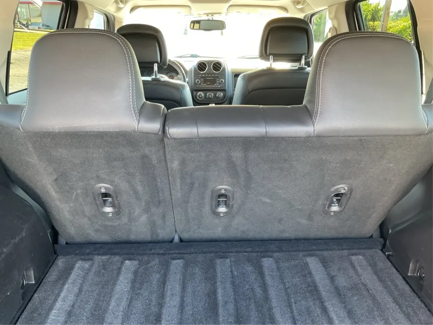 2015 Jeep Patriot High Altitude Edition (1C4NJPFA5FD) with an 2L I-4 DOHC engine, located at 1951 S Dayton Lakeview Rd., New Carlisle, OH, 45344, (937) 908-9800, 39.890999, -84.050255 - Discover the perfect blend of adventure and everyday practicality with the 2015 Jeep Patriot High Altitude Edition, now available at Advantage Car and Credit in Moraine, OH! Designed for those who want to conquer both the urban jungle and the great outdoors, this SUV is not just a vehicle; it's a li - Photo#12