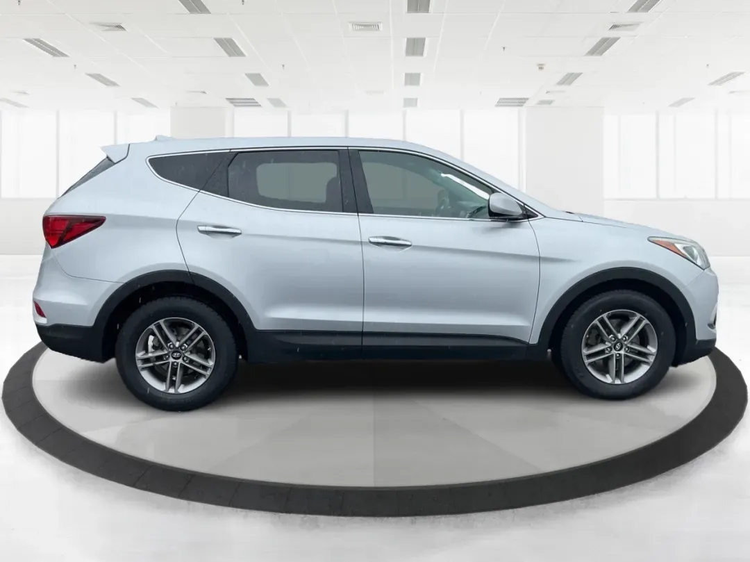 2017 Hyundai Santa Fe 2.4L (5XYZTDLB2HG) with an Theta II 2.4L I-4 gasoline direct injection engine, located at 1951 S Dayton Lakeview Rd., New Carlisle, OH, 45344, (937) 908-9800, 39.890999, -84.050255 - Discover the perfect blend of comfort, capability, and style with the 2017 Hyundai Santa Fe, now available at Advantage Car and Credit, located at 1184 Kauffman Ave, Fairborn, OH 45324. This versatile SUV is an excellent choice for growing families, weekend adventurers, or budget-conscious buyers lo - Photo#1