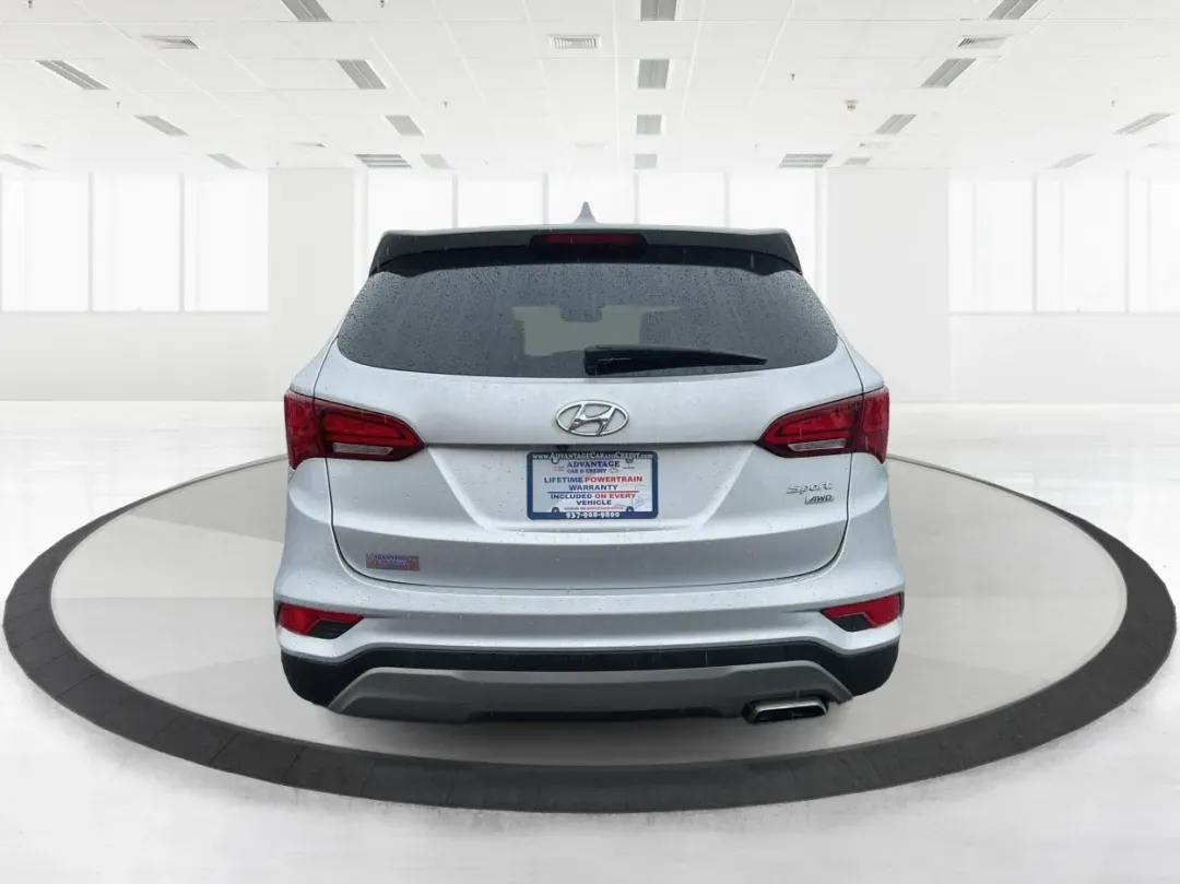 2017 Hyundai Santa Fe 2.4L (5XYZTDLB2HG) with an Theta II 2.4L I-4 gasoline direct injection engine, located at 1951 S Dayton Lakeview Rd., New Carlisle, OH, 45344, (937) 908-9800, 39.890999, -84.050255 - Discover the perfect blend of comfort, capability, and style with the 2017 Hyundai Santa Fe, now available at Advantage Car and Credit, located at 1184 Kauffman Ave, Fairborn, OH 45324. This versatile SUV is an excellent choice for growing families, weekend adventurers, or budget-conscious buyers lo - Photo#3