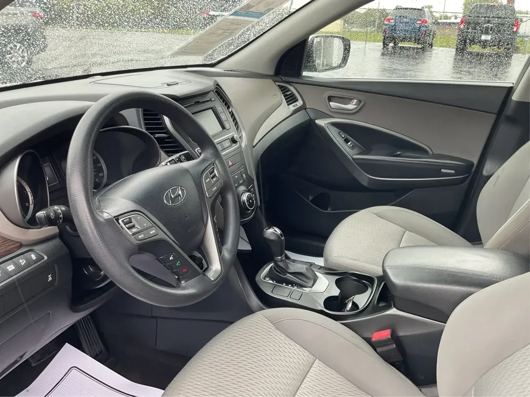 2017 Hyundai Santa Fe 2.4L (5XYZTDLB2HG) with an Theta II 2.4L I-4 gasoline direct injection engine, located at 1951 S Dayton Lakeview Rd., New Carlisle, OH, 45344, (937) 908-9800, 39.890999, -84.050255 - Discover the perfect blend of comfort, capability, and style with the 2017 Hyundai Santa Fe, now available at Advantage Car and Credit, located at 1184 Kauffman Ave, Fairborn, OH 45324. This versatile SUV is an excellent choice for growing families, weekend adventurers, or budget-conscious buyers lo - Photo#9