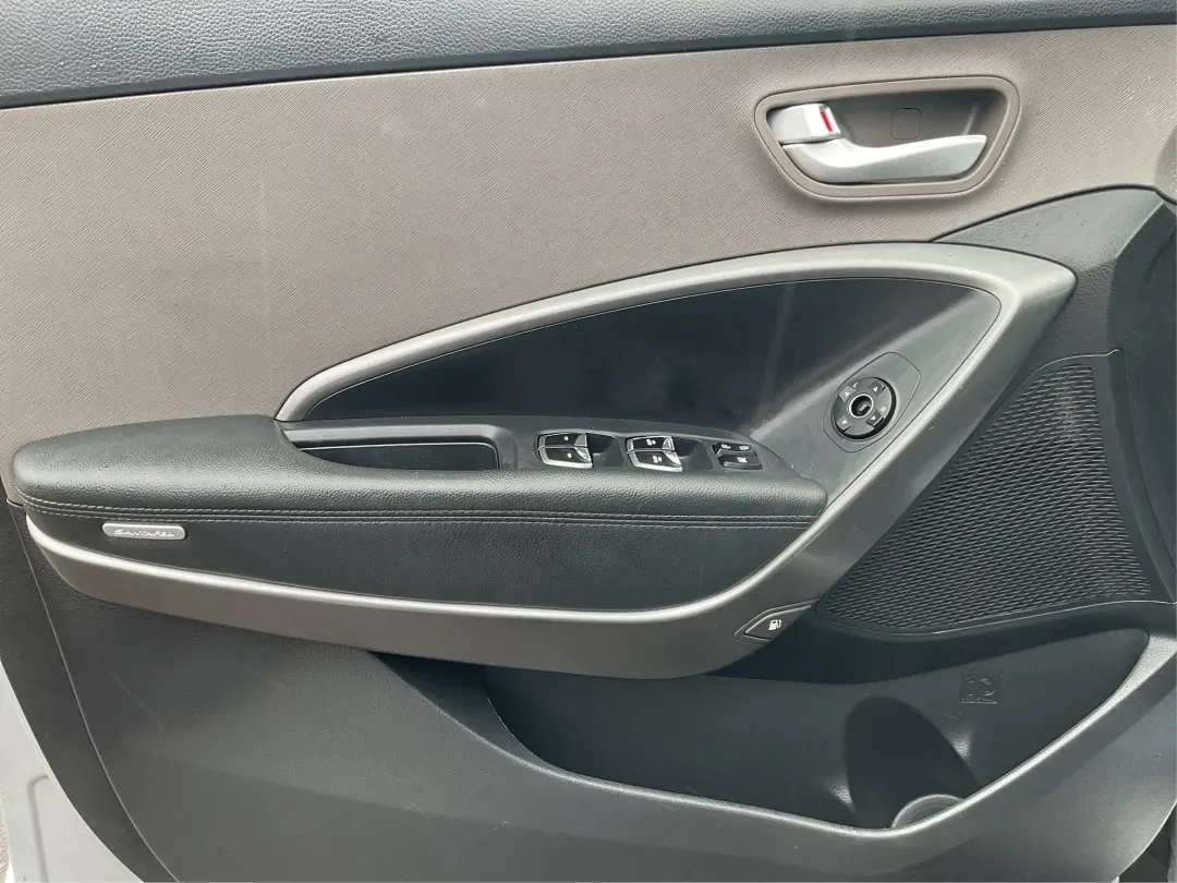 2017 Hyundai Santa Fe 2.4L (5XYZTDLB2HG) with an Theta II 2.4L I-4 gasoline direct injection engine, located at 1951 S Dayton Lakeview Rd., New Carlisle, OH, 45344, (937) 908-9800, 39.890999, -84.050255 - Discover the perfect blend of comfort, capability, and style with the 2017 Hyundai Santa Fe, now available at Advantage Car and Credit, located at 1184 Kauffman Ave, Fairborn, OH 45324. This versatile SUV is an excellent choice for growing families, weekend adventurers, or budget-conscious buyers lo - Photo#17