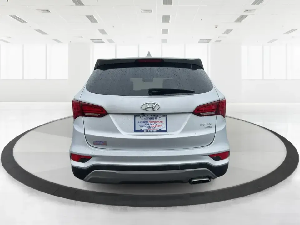 2017 Hyundai Santa Fe 2.4L (5XYZTDLB2HG) with an Theta II 2.4L I-4 gasoline direct injection engine, 6A transmission, located at 1951 S Dayton Lakeview Rd., New Carlisle, OH, 45344, (937) 908-9800, 39.890999, -84.050255 - Discover the perfect blend of comfort, capability, and style with the 2017 Hyundai Santa Fe, now available at Advantage Car and Credit, located at 1184 Kauffman Ave, Fairborn, OH 45324. This versatile SUV is an excellent choice for growing families, weekend adventurers, or budget-conscious buyers lo - Photo#3