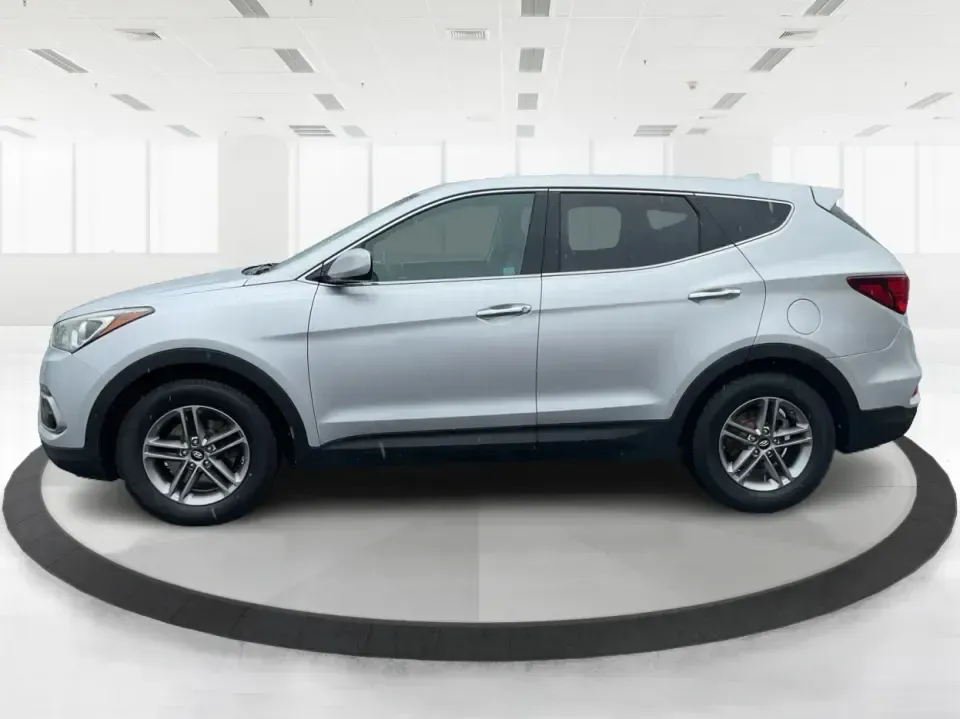 2017 Hyundai Santa Fe 2.4L (5XYZTDLB2HG) with an Theta II 2.4L I-4 gasoline direct injection engine, 6A transmission, located at 1951 S Dayton Lakeview Rd., New Carlisle, OH, 45344, (937) 908-9800, 39.890999, -84.050255 - Discover the perfect blend of comfort, capability, and style with the 2017 Hyundai Santa Fe, now available at Advantage Car and Credit, located at 1184 Kauffman Ave, Fairborn, OH 45324. This versatile SUV is an excellent choice for growing families, weekend adventurers, or budget-conscious buyers lo - Photo#5