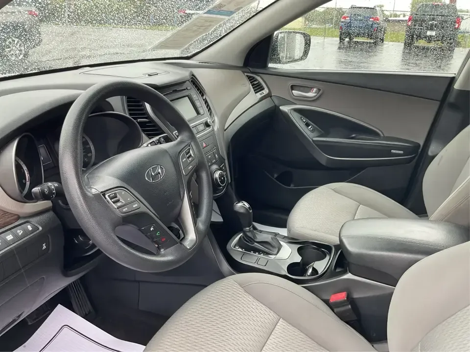 2017 Hyundai Santa Fe 2.4L (5XYZTDLB2HG) with an Theta II 2.4L I-4 gasoline direct injection engine, 6A transmission, located at 1951 S Dayton Lakeview Rd., New Carlisle, OH, 45344, (937) 908-9800, 39.890999, -84.050255 - Discover the perfect blend of comfort, capability, and style with the 2017 Hyundai Santa Fe, now available at Advantage Car and Credit, located at 1184 Kauffman Ave, Fairborn, OH 45324. This versatile SUV is an excellent choice for growing families, weekend adventurers, or budget-conscious buyers lo - Photo#9