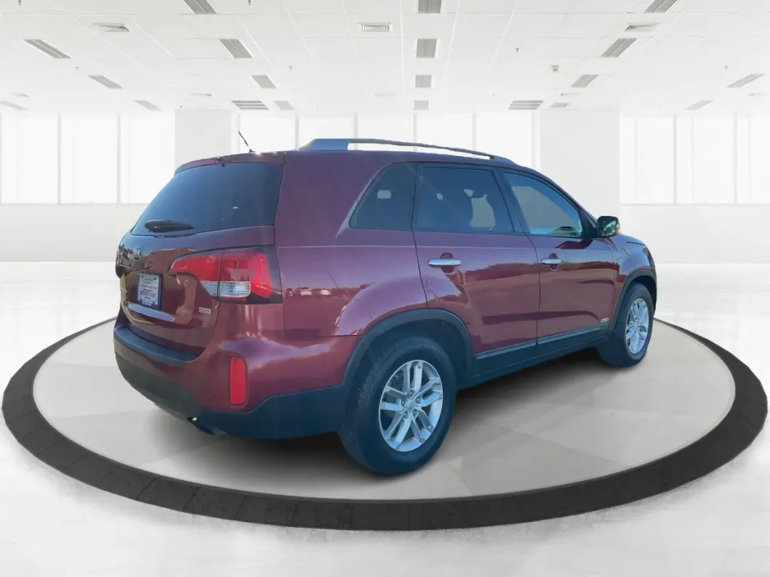 2015 Kia Sorento LX (5XYKTCA66FG) with an 2.4L I-4 gasoline direct injection engine, located at 1951 S Dayton Lakeview Rd., New Carlisle, OH, 45344, (937) 908-9800, 39.890999, -84.050255 - **Adventure Awaits with the 2015 Kia Sorento LX from Advantage Car and Credit!**<br /> <br /> Are you ready to elevate your family outings or embark on unforgettable weekend adventures? Look no further than this stunning **2015 Kia Sorento LX**! With its striking Remington Red Metallic exterior and - Photo#2