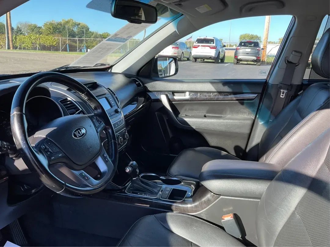 2015 Kia Sorento LX (5XYKTCA66FG) with an 2.4L I-4 gasoline direct injection engine, located at 1951 S Dayton Lakeview Rd., New Carlisle, OH, 45344, (937) 908-9800, 39.890999, -84.050255 - **Adventure Awaits with the 2015 Kia Sorento LX from Advantage Car and Credit!**<br /> <br /> Are you ready to elevate your family outings or embark on unforgettable weekend adventures? Look no further than this stunning **2015 Kia Sorento LX**! With its striking Remington Red Metallic exterior and - Photo#9