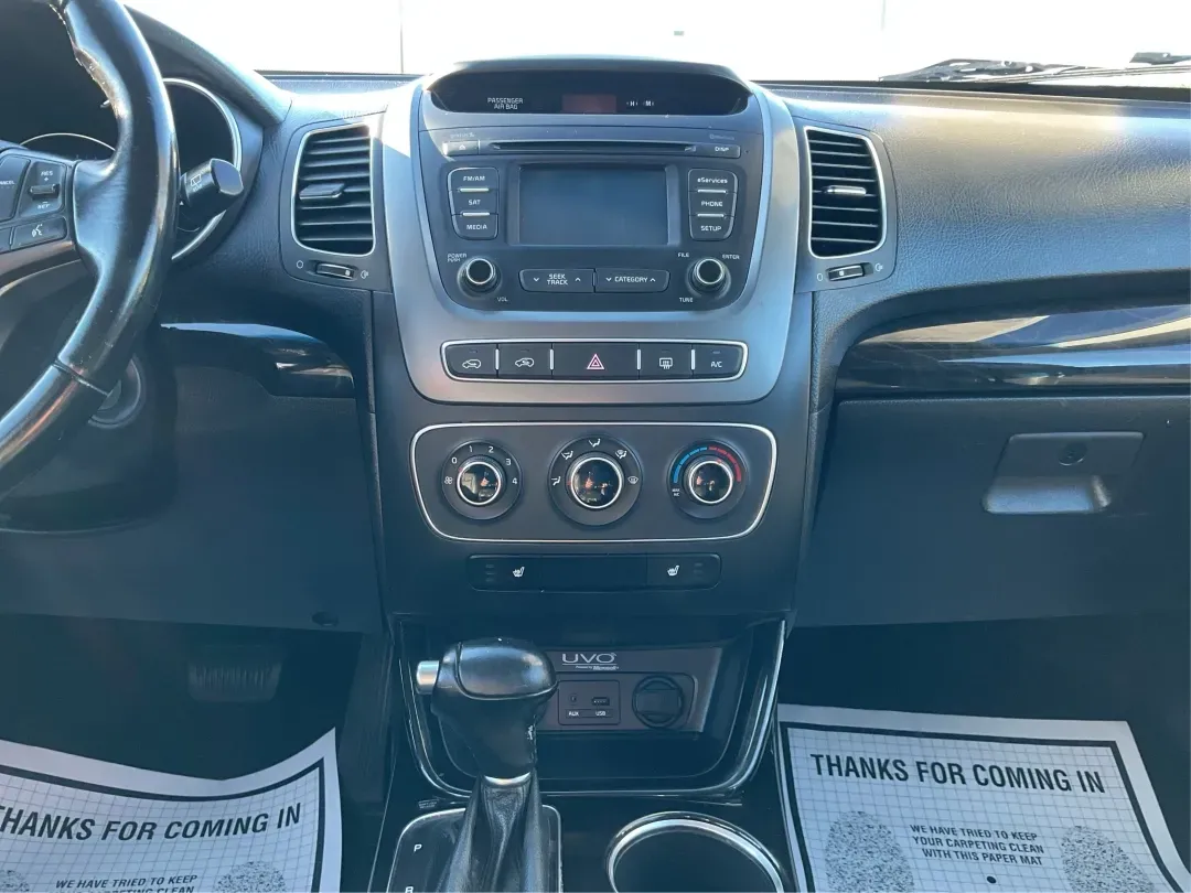 2015 Kia Sorento LX (5XYKTCA66FG) with an 2.4L I-4 gasoline direct injection engine, located at 1951 S Dayton Lakeview Rd., New Carlisle, OH, 45344, (937) 908-9800, 39.890999, -84.050255 - **Adventure Awaits with the 2015 Kia Sorento LX from Advantage Car and Credit!**<br /> <br /> Are you ready to elevate your family outings or embark on unforgettable weekend adventures? Look no further than this stunning **2015 Kia Sorento LX**! With its striking Remington Red Metallic exterior and - Photo#13