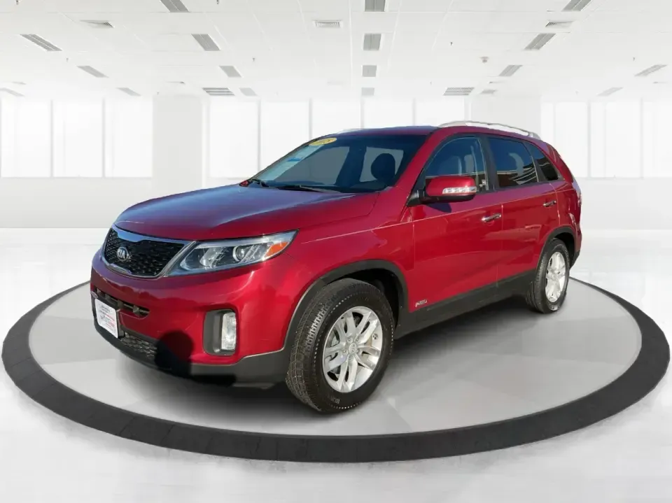 2015 Kia Sorento LX (5XYKTCA66FG) with an 2.4L I-4 gasoline direct injection engine, 6-Speed Automatic transmission, located at 8750 N County Rd 25A, Piqua, OH, 45356, (937) 908-9800, 40.164391, -84.232513 - **Adventure Awaits with the 2015 Kia Sorento LX from Advantage Car and Credit!**<br /> <br /> Are you ready to elevate your family outings or embark on unforgettable weekend adventures? Look no further than this stunning **2015 Kia Sorento LX**! With its striking Remington Red Metallic exterior and - Photo#8