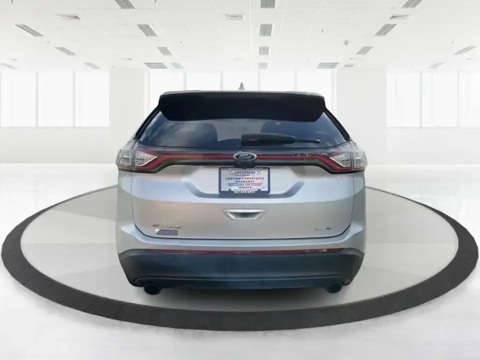 2016 Ford Edge SE (2FMPK4G9XGB) with an EcoBoost 2L I-4 gasoline direct injection engine, 6A transmission, located at 1099 N County Rd 25A, Troy, OH, 45373, (937) 908-9800, 40.057079, -84.212883 - Rev up your lifestyle with the perfect blend of style, comfort, and utility that the 2016 Ford Edge SE offers! If you're looking for a reliable SUV that seamlessly fits into your busy life-whether it's taking the kids to school, embarking on family adventures, or handling your daily commute-this veh - Photo#3