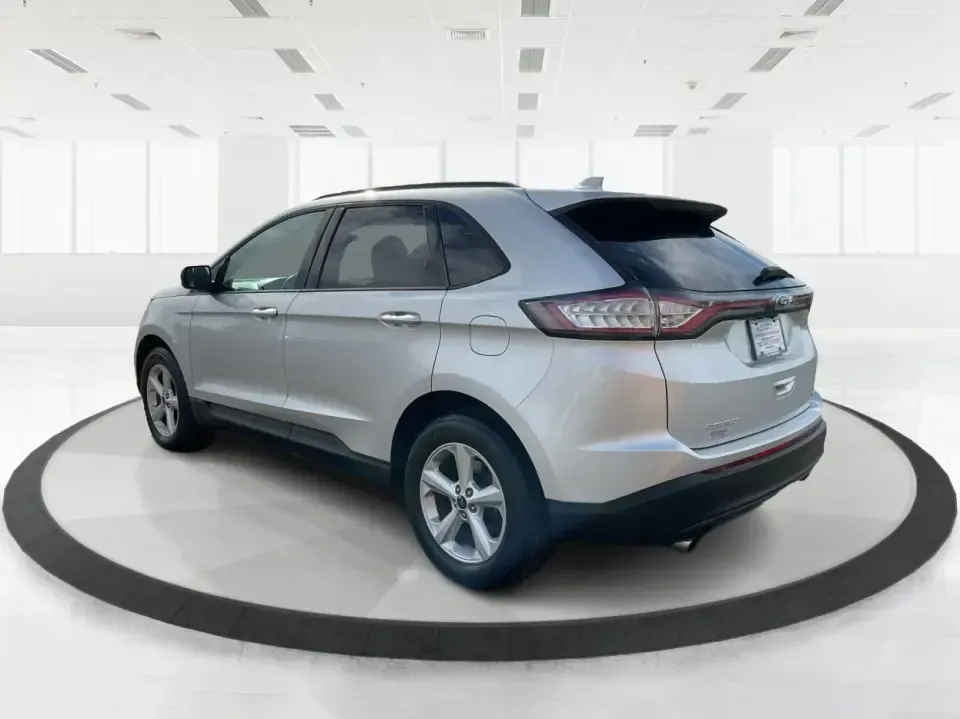 2016 Ford Edge SE (2FMPK4G9XGB) with an EcoBoost 2L I-4 gasoline direct injection engine, 6A transmission, located at 1099 N County Rd 25A, Troy, OH, 45373, (937) 908-9800, 40.057079, -84.212883 - Rev up your lifestyle with the perfect blend of style, comfort, and utility that the 2016 Ford Edge SE offers! If you're looking for a reliable SUV that seamlessly fits into your busy life-whether it's taking the kids to school, embarking on family adventures, or handling your daily commute-this veh - Photo#4