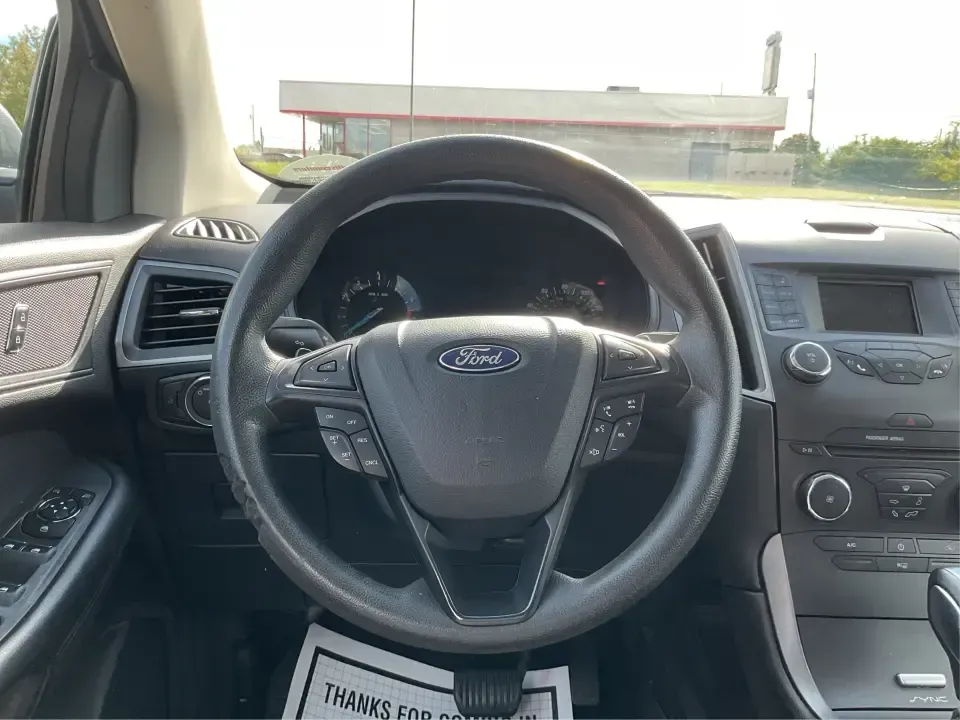 2016 Ford Edge SE (2FMPK4G9XGB) with an EcoBoost 2L I-4 gasoline direct injection engine, 6A transmission, located at 1099 N County Rd 25A, Troy, OH, 45373, (937) 908-9800, 40.057079, -84.212883 - Rev up your lifestyle with the perfect blend of style, comfort, and utility that the 2016 Ford Edge SE offers! If you're looking for a reliable SUV that seamlessly fits into your busy life-whether it's taking the kids to school, embarking on family adventures, or handling your daily commute-this veh - Photo#16