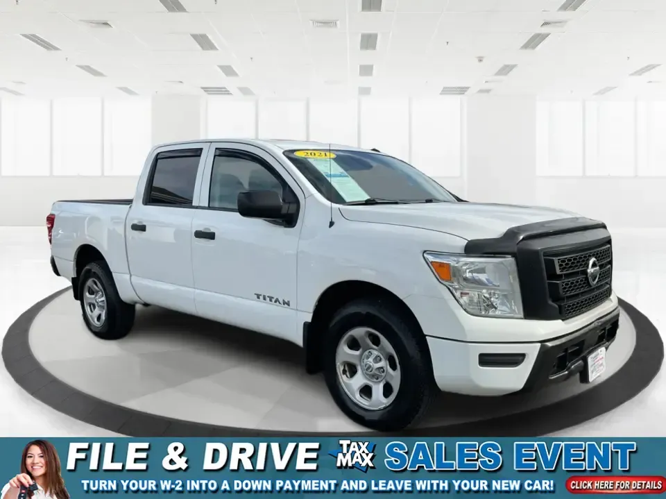 2021 Nissan TITAN Crew Cab S 4x4 (1N6AA1EC4MN) with an Endurance 5.6L V-8 gasoline direct injection engine, 9A transmission, located at 1099 N County Rd 25A, Troy, OH, 45373, (937) 908-9800, 40.057079, -84.212883 - Discover ultimate versatility and rugged capability with this 2021 Nissan TITAN Crew Cab S 4x4, now available at Advantage Car and Credit in Piqua, OH. Whether you're navigating the bustling streets of Piqua or heading out for weekend adventures, this truck is designed to adapt to your lifestyle. Pe - Photo#0