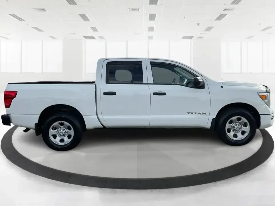 2021 Nissan TITAN Crew Cab S 4x4 (1N6AA1EC4MN) with an Endurance 5.6L V-8 gasoline direct injection engine, 9A transmission, located at 1099 N County Rd 25A, Troy, OH, 45373, (937) 908-9800, 40.057079, -84.212883 - Discover ultimate versatility and rugged capability with this 2021 Nissan TITAN Crew Cab S 4x4, now available at Advantage Car and Credit in Piqua, OH. Whether you're navigating the bustling streets of Piqua or heading out for weekend adventures, this truck is designed to adapt to your lifestyle. Pe - Photo#1