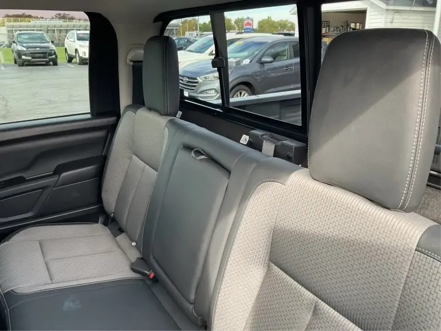 2021 Nissan TITAN Crew Cab S 4x4 (1N6AA1EC4MN) with an Endurance 5.6L V-8 gasoline direct injection engine, 9A transmission, located at 401 Woodman Dr, Riverside, OH, 45431, (937) 908-9800, 39.760899, -84.123421 - Discover ultimate versatility and rugged capability with this 2021 Nissan TITAN Crew Cab S 4x4, now available at Advantage Car and Credit in Piqua, OH. Whether you're navigating the bustling streets of Piqua or heading out for weekend adventures, this truck is designed to adapt to your lifestyle. Pe - Photo#10