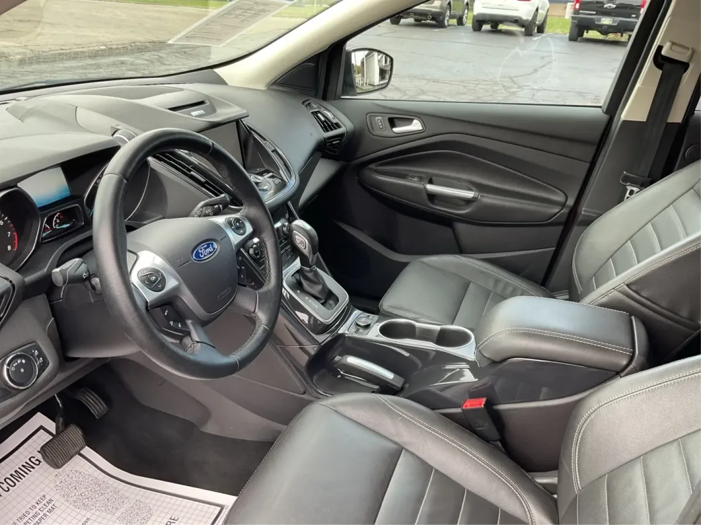 2014 Ford Escape Titanium (1FMCU9J97EU) with an Other engine, located at 401 Woodman Dr, Riverside, OH, 45431, (937) 908-9800, 39.760899, -84.123421 - Elevate your daily commute and weekend adventures with the perfect blend of style and practicality-meet the 2014 Ford Escape Titanium, available now at Advantage Car and Credit in Fairborn, OH! This SUV is not just about getting from point A to point B; it's about enhancing your lifestyle, making it - Photo#8