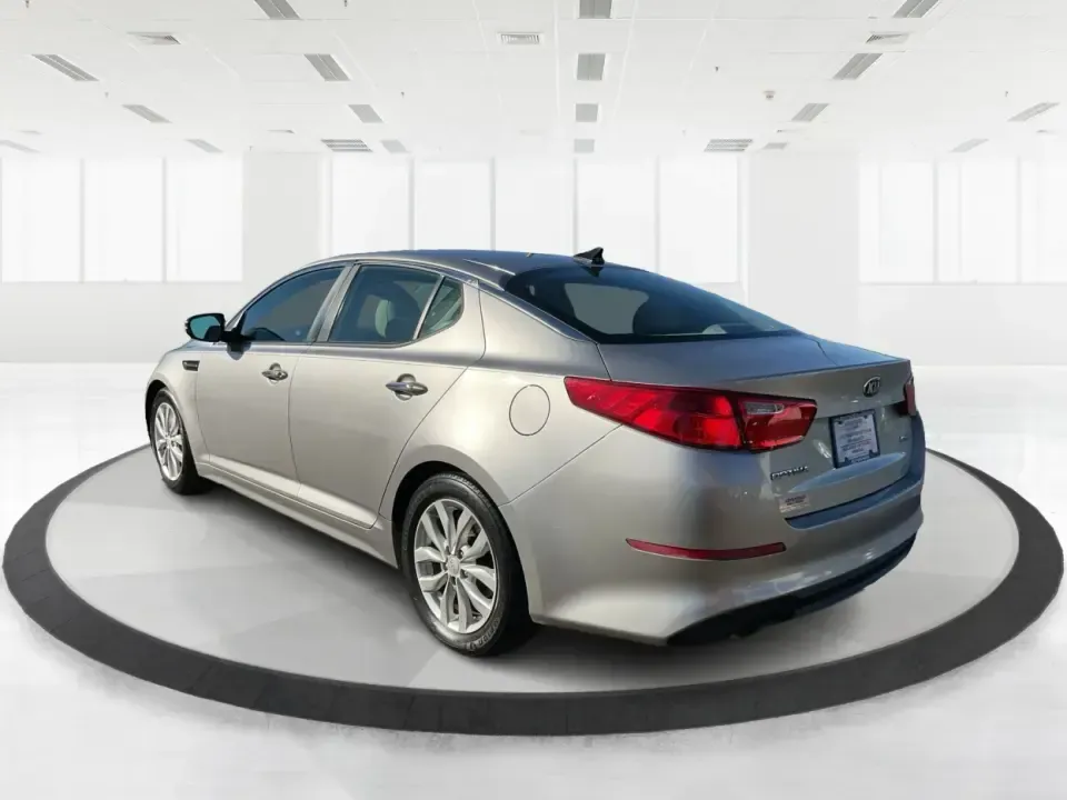 2015 Kia Optima EX (5XXGN4A74FG) with an Theta II 2.4L I-4 gasoline direct injection engine, 6-Speed Automatic transmission, located at 1099 N County Rd 25A, Troy, OH, 45373, (937) 908-9800, 40.057079, -84.212883 - Experience the perfect blend of style, comfort, and reliability with this 2015 Kia Optima EX at Advantage Car and Credit in Xenia, OH. Whether you're embarking on daily commutes, family road trips, or simply looking for a trusty companion for your adventures, this vehicle is designed to meet your di - Photo#4