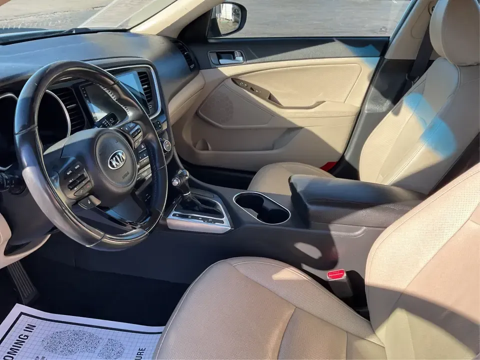 2015 Kia Optima EX (5XXGN4A74FG) with an Theta II 2.4L I-4 gasoline direct injection engine, 6-Speed Automatic transmission, located at 1099 N County Rd 25A, Troy, OH, 45373, (937) 908-9800, 40.057079, -84.212883 - Experience the perfect blend of style, comfort, and reliability with this 2015 Kia Optima EX at Advantage Car and Credit in Xenia, OH. Whether you're embarking on daily commutes, family road trips, or simply looking for a trusty companion for your adventures, this vehicle is designed to meet your di - Photo#9