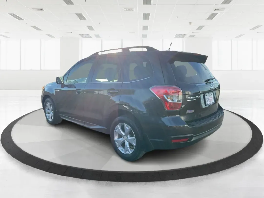 2015 Subaru Forester 2.5i Limited (JF2SJAHC5FH) with an 2.5L H-4 DOHC engine, located at 401 Woodman Dr, Riverside, OH, 45431, (937) 908-9800, 39.760899, -84.123421 - Looking for a reliable vehicle that can seamlessly transition from daily commutes to weekend adventures? Look no further than the 2015 Subaru Forester 2.5i Limited, available now at Advantage Car and Credit in Xenia, OH. This versatile SUV is perfect for growing families, outdoor enthusiasts, and an - Photo#4