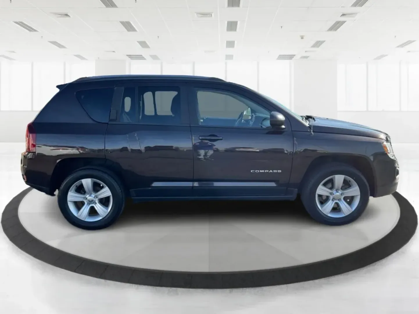 2014 Jeep Compass Sport (1C4NJDBB8ED) with an 2.4L I-4 DOHC engine, located at 1099 N County Rd 25A, Troy, OH, 45373, (937) 908-9800, 40.057079, -84.212883 - Discover the adventure-ready 2014 Jeep Compass, an SUV that's perfect for weekend getaways and daily commutes alike. Whether you're navigating the bustling streets of Troy or heading out on a family road trip to nearby attractions like the Miami County Fair, this rugged vehicle will elevate your dri - Photo#1