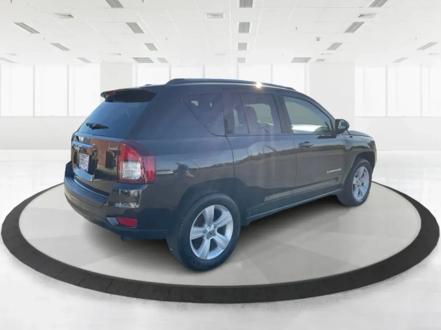 2014 Jeep Compass Sport (1C4NJDBB8ED) with an 2.4L I-4 DOHC engine, located at 1099 N County Rd 25A, Troy, OH, 45373, (937) 908-9800, 40.057079, -84.212883 - Discover the adventure-ready 2014 Jeep Compass, an SUV that's perfect for weekend getaways and daily commutes alike. Whether you're navigating the bustling streets of Troy or heading out on a family road trip to nearby attractions like the Miami County Fair, this rugged vehicle will elevate your dri - Photo#2