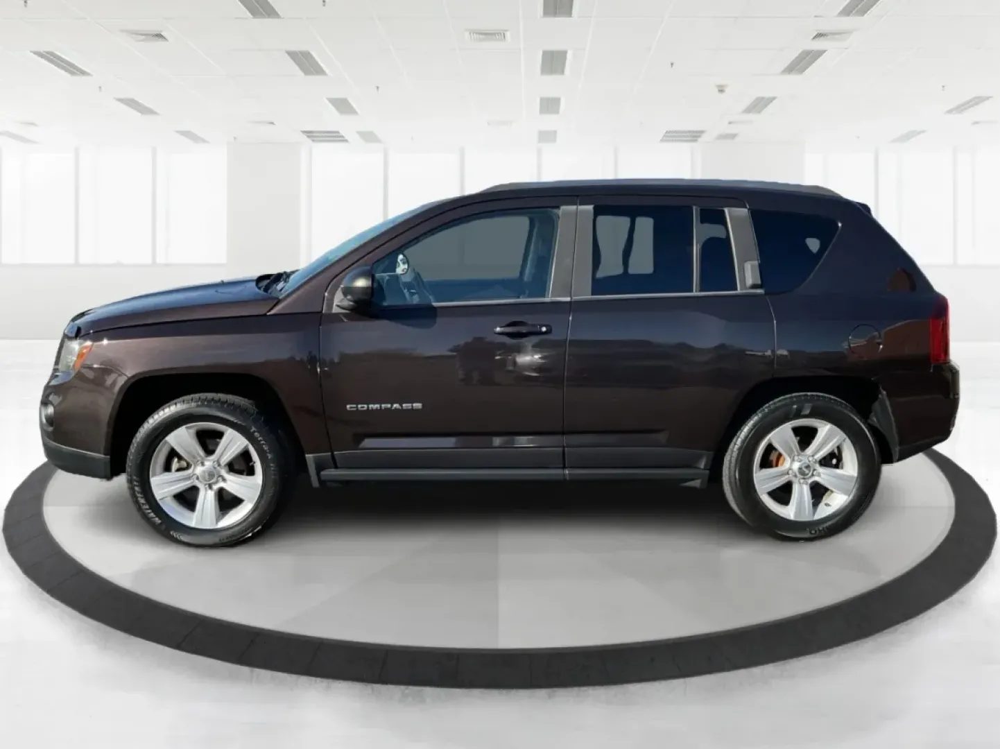2014 Jeep Compass Sport (1C4NJDBB8ED) with an 2.4L I-4 DOHC engine, located at 1099 N County Rd 25A, Troy, OH, 45373, (937) 908-9800, 40.057079, -84.212883 - Discover the adventure-ready 2014 Jeep Compass, an SUV that's perfect for weekend getaways and daily commutes alike. Whether you're navigating the bustling streets of Troy or heading out on a family road trip to nearby attractions like the Miami County Fair, this rugged vehicle will elevate your dri - Photo#5