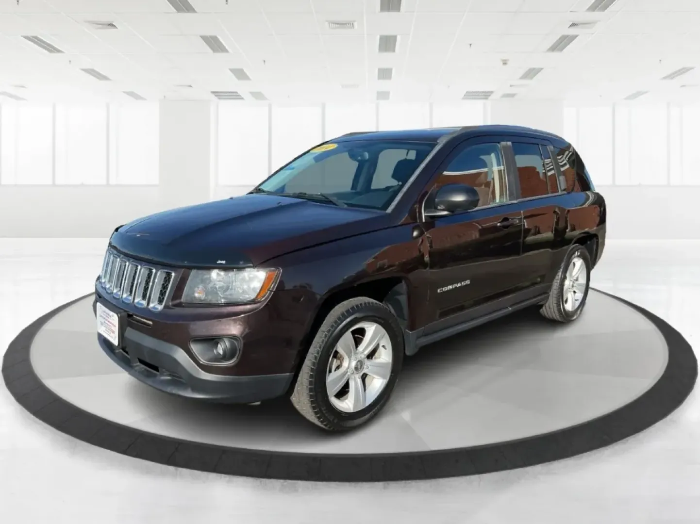 2014 Jeep Compass Sport (1C4NJDBB8ED) with an 2.4L I-4 DOHC engine, located at 1099 N County Rd 25A, Troy, OH, 45373, (937) 908-9800, 40.057079, -84.212883 - Discover the adventure-ready 2014 Jeep Compass, an SUV that's perfect for weekend getaways and daily commutes alike. Whether you're navigating the bustling streets of Troy or heading out on a family road trip to nearby attractions like the Miami County Fair, this rugged vehicle will elevate your dri - Photo#8