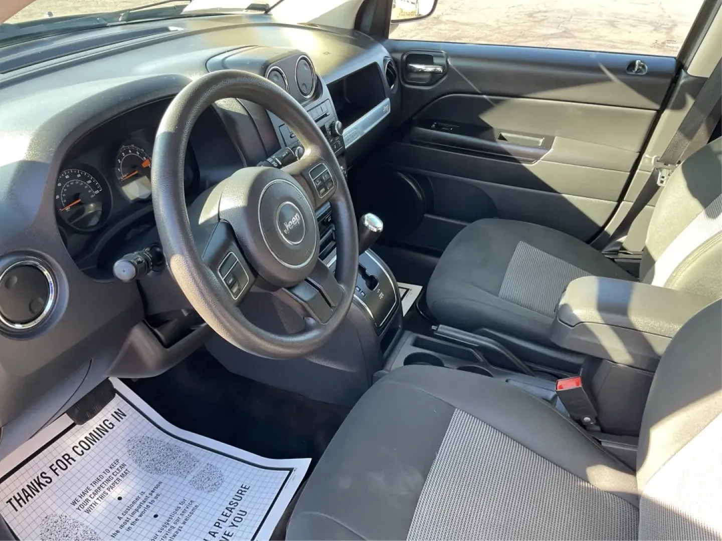 2014 Jeep Compass Sport (1C4NJDBB8ED) with an 2.4L I-4 DOHC engine, located at 1099 N County Rd 25A, Troy, OH, 45373, (937) 908-9800, 40.057079, -84.212883 - Discover the adventure-ready 2014 Jeep Compass, an SUV that's perfect for weekend getaways and daily commutes alike. Whether you're navigating the bustling streets of Troy or heading out on a family road trip to nearby attractions like the Miami County Fair, this rugged vehicle will elevate your dri - Photo#9