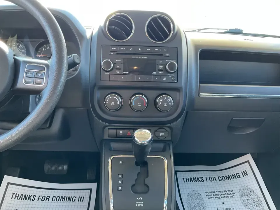 2016 Jeep Patriot Sport (1C4NJPBB6GD) with an 2.4L L4 DOHC 16V engine, Automatic transmission, located at 8750 N County Rd 25A, Piqua, OH, 45356, (937) 908-9800, 40.164391, -84.232513 - **Adventure Awaits with the 2016 Jeep Patriot Sport! Perfect for Your Next Journey!**<br /> <br /> Are you ready to tackle family road trips, weekend getaways, or daily commutes with confidence? The 2016 Jeep Patriot Sport is the versatile SUV you've been searching for! This rugged vehicle combines - Photo#13