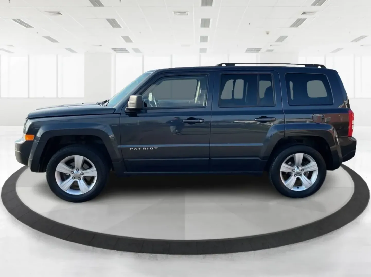 2015 Jeep Patriot Latitude (1C4NJRFB2FD) with an 2.4L I-4 DOHC engine, located at 8750 N County Rd 25A, Piqua, OH, 45356, (937) 908-9800, 40.164391, -84.232513 - **Explore the Open Road with Confidence in this 2015 Jeep Patriot Latitude!**<br /> <br /> Are you ready to embrace new adventures? This 2015 Jeep Patriot Latitude is the perfect companion for anyone looking to escape the hustle and bustle of daily life. With its sleek Maximum Steel Metallic Clearco - Photo#5