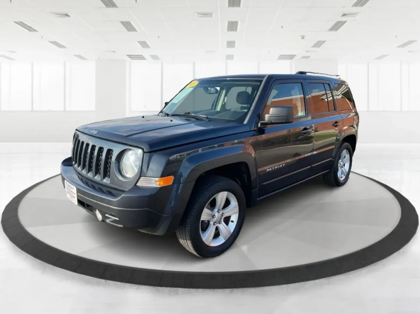 2015 Jeep Patriot Latitude (1C4NJRFB2FD) with an 2.4L I-4 DOHC engine, located at 8750 N County Rd 25A, Piqua, OH, 45356, (937) 908-9800, 40.164391, -84.232513 - **Explore the Open Road with Confidence in this 2015 Jeep Patriot Latitude!**<br /> <br /> Are you ready to embrace new adventures? This 2015 Jeep Patriot Latitude is the perfect companion for anyone looking to escape the hustle and bustle of daily life. With its sleek Maximum Steel Metallic Clearco - Photo#8