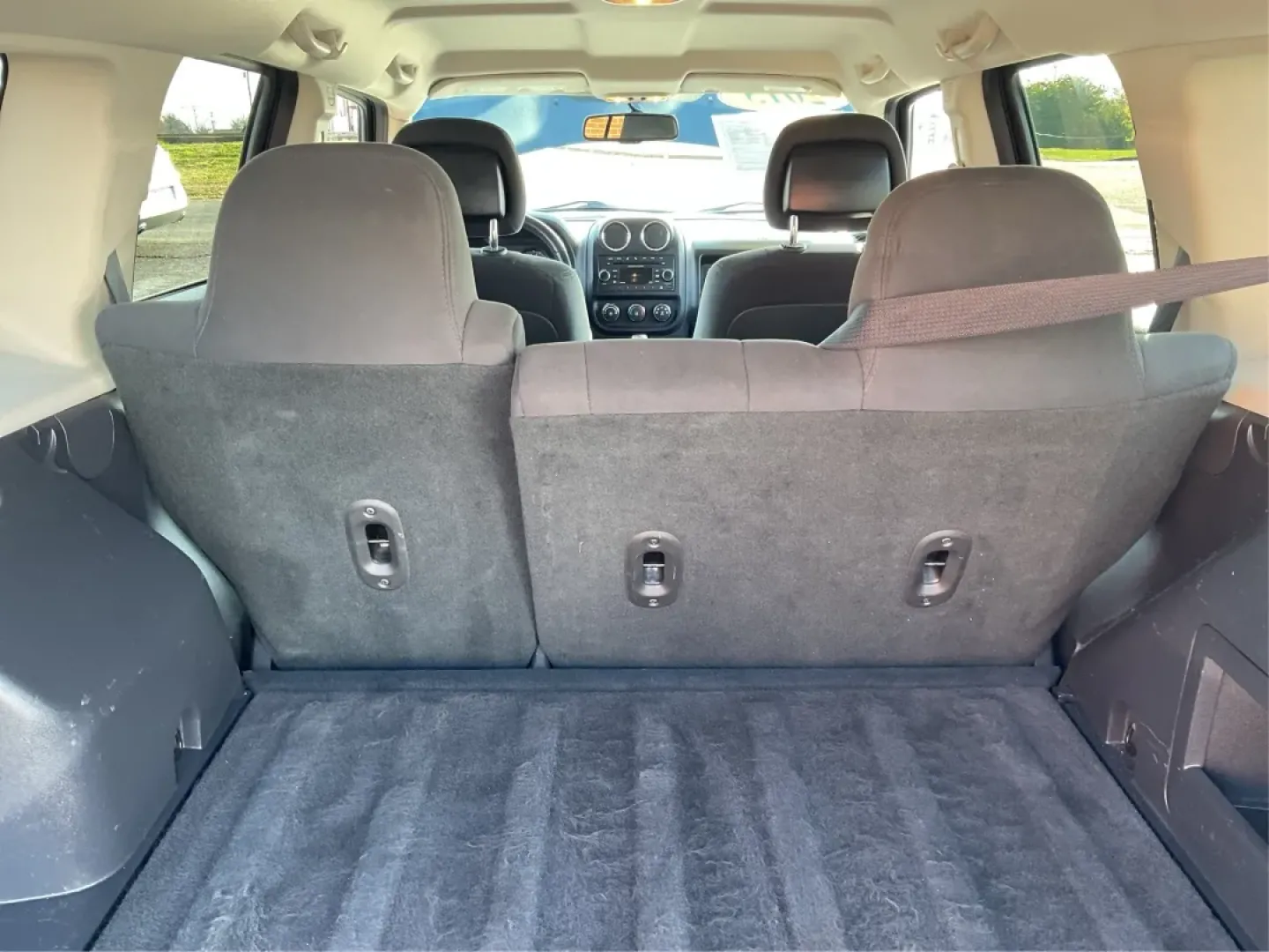 2015 Jeep Patriot Latitude (1C4NJRFB2FD) with an 2.4L I-4 DOHC engine, located at 8750 N County Rd 25A, Piqua, OH, 45356, (937) 908-9800, 40.164391, -84.232513 - **Explore the Open Road with Confidence in this 2015 Jeep Patriot Latitude!**<br /> <br /> Are you ready to embrace new adventures? This 2015 Jeep Patriot Latitude is the perfect companion for anyone looking to escape the hustle and bustle of daily life. With its sleek Maximum Steel Metallic Clearco - Photo#12