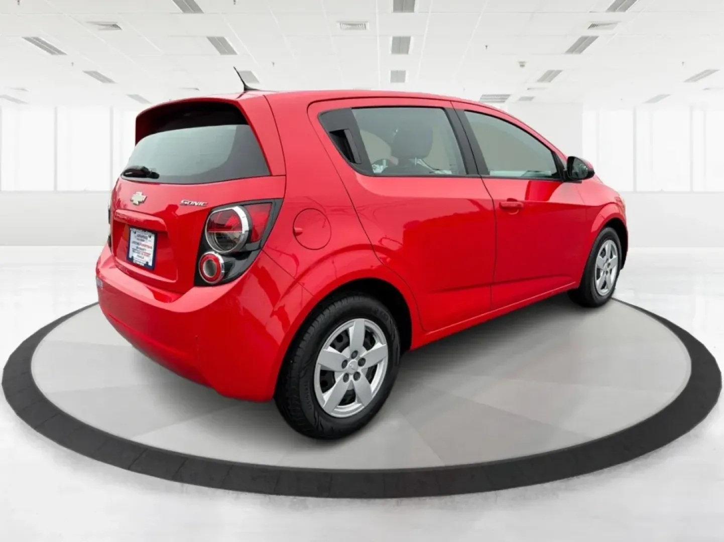2014 Chevrolet Sonic LS Auto (1G1JA6SH1E4) with an Other engine, located at 1951 S Dayton Lakeview Rd., New Carlisle, OH, 45344, (937) 908-9800, 39.890999, -84.050255 - Are you in search of a reliable hatchback that perfectly balances style, efficiency, and practicality? Look no further than this stunning 2014 Chevrolet Sonic LS Auto, now available at Advantage Car and Credit in Riverside, OH. This vehicle is not just a mode of transportation; it's your new partner - Photo#2