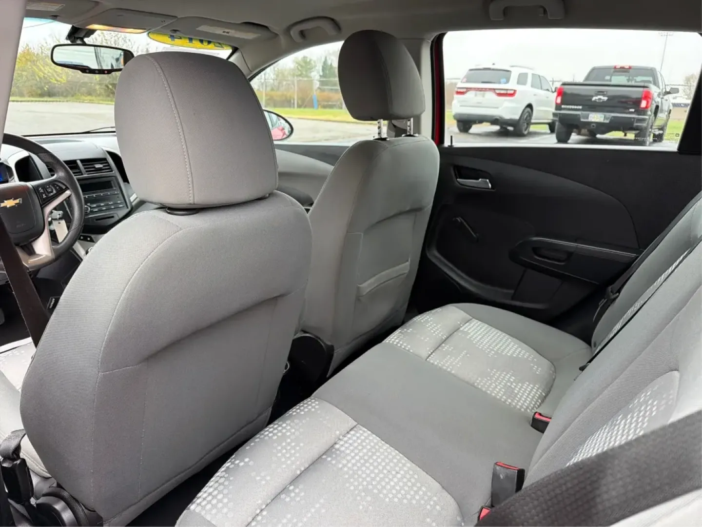 2014 Chevrolet Sonic LS Auto (1G1JA6SH1E4) with an Other engine, located at 1951 S Dayton Lakeview Rd., New Carlisle, OH, 45344, (937) 908-9800, 39.890999, -84.050255 - Are you in search of a reliable hatchback that perfectly balances style, efficiency, and practicality? Look no further than this stunning 2014 Chevrolet Sonic LS Auto, now available at Advantage Car and Credit in Riverside, OH. This vehicle is not just a mode of transportation; it's your new partner - Photo#10