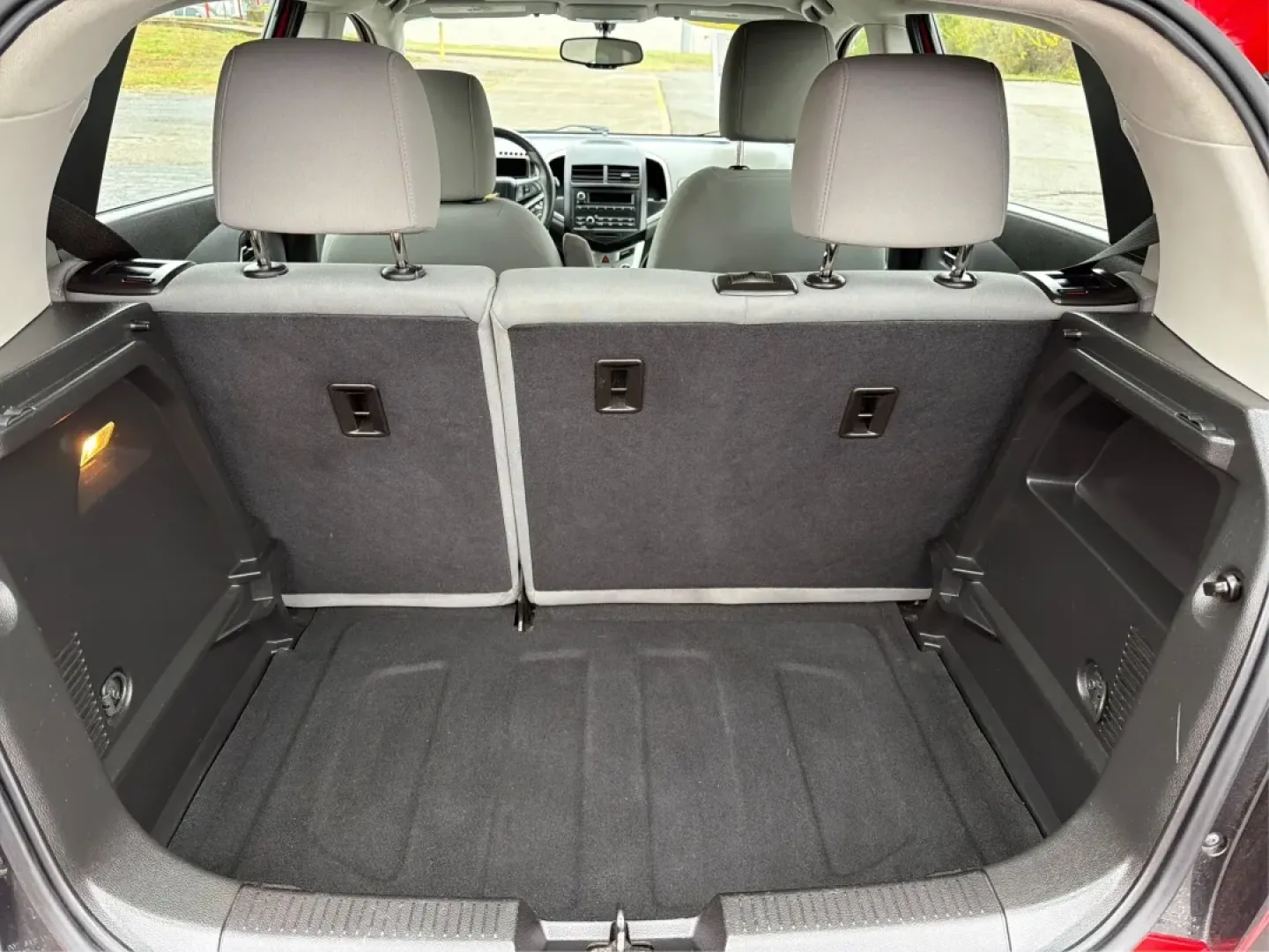 2014 Chevrolet Sonic LS Auto (1G1JA6SH1E4) with an Other engine, located at 1951 S Dayton Lakeview Rd., New Carlisle, OH, 45344, (937) 908-9800, 39.890999, -84.050255 - Are you in search of a reliable hatchback that perfectly balances style, efficiency, and practicality? Look no further than this stunning 2014 Chevrolet Sonic LS Auto, now available at Advantage Car and Credit in Riverside, OH. This vehicle is not just a mode of transportation; it's your new partner - Photo#12