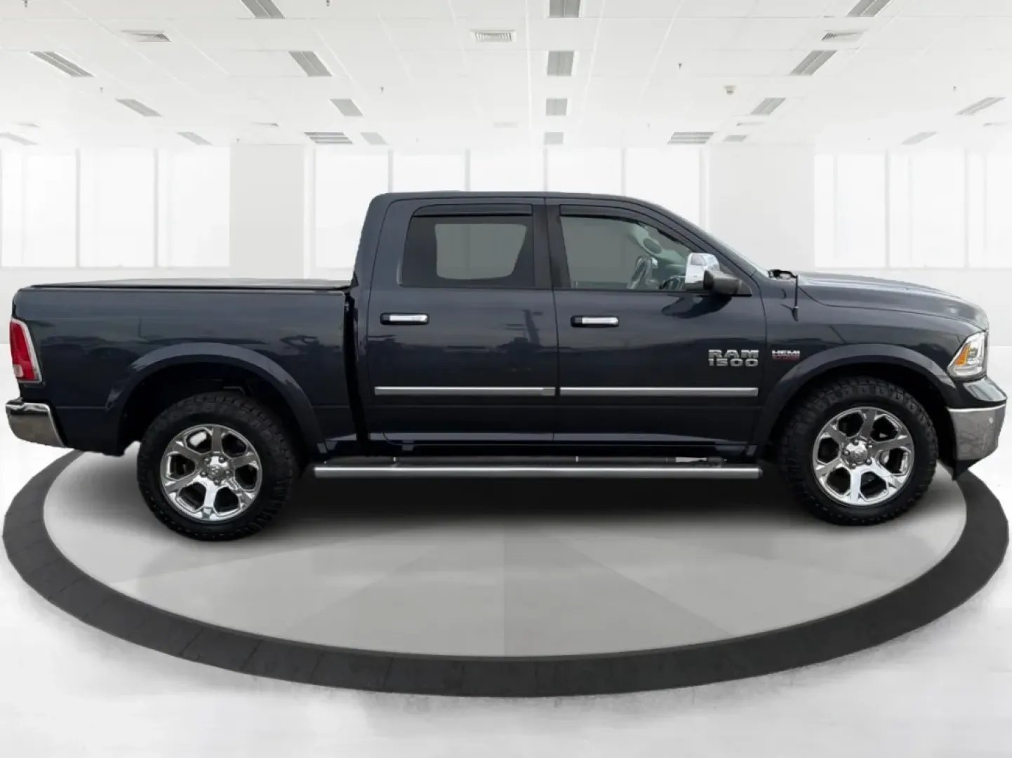 2014 Ram 1500 Laramie (1C6RR7NT8ES) with an Other engine, located at 1951 S Dayton Lakeview Rd., New Carlisle, OH, 45344, (937) 908-9800, 39.890999, -84.050255 - Are you ready to elevate your driving experience and tackle any adventure that comes your way? The 2014 Ram 1500 Laramie is not just a truck; it's an embodiment of capability, comfort, and style, making it perfect for those who lead an active lifestyle in New Carlisle, OH. Whether you're gearing up - Photo#1