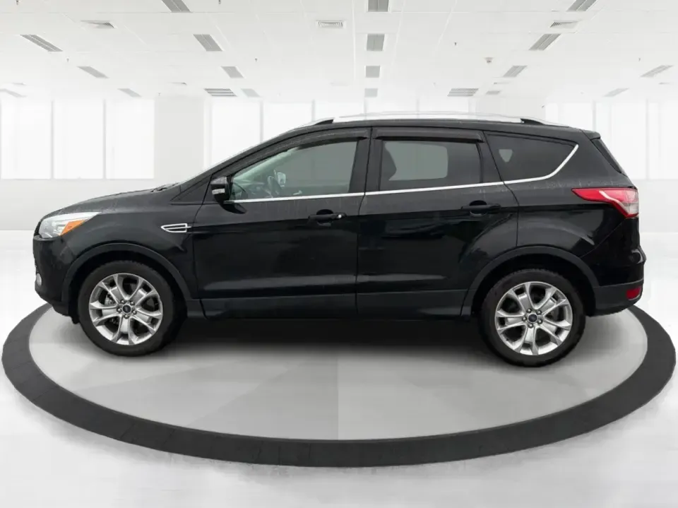 2016 Ford Escape Titanium (1FMCU0J94GU) with an 2.0L L4 DOHC 16V engine, 6-Speed Automatic transmission, located at 1184 Kauffman Ave, Fairborn, OH, 45324, (937) 908-9800, 39.807072, -84.030914 - **Explore New Adventures with the 2016 Ford Escape Titanium Perfect for Families and Commuters Alike!**<br /> <br /> Are you ready to elevate your driving experience? The 2016 Ford Escape Titanium is the ideal companion for both bustling family life and daily commutes, bringing together style, comf - Photo#5