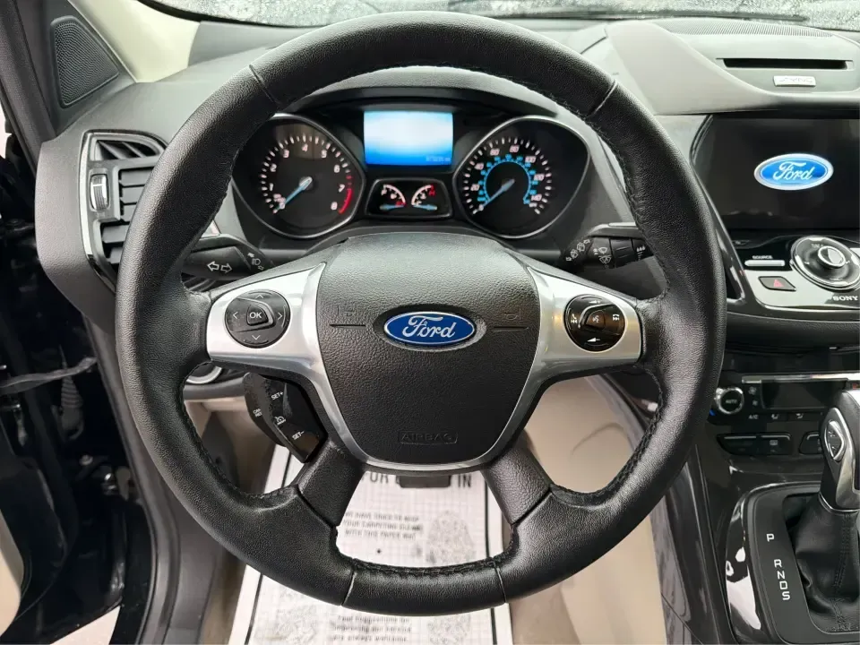 2016 Ford Escape Titanium (1FMCU0J94GU) with an 2.0L L4 DOHC 16V engine, 6-Speed Automatic transmission, located at 1184 Kauffman Ave, Fairborn, OH, 45324, (937) 908-9800, 39.807072, -84.030914 - **Explore New Adventures with the 2016 Ford Escape Titanium Perfect for Families and Commuters Alike!**<br /> <br /> Are you ready to elevate your driving experience? The 2016 Ford Escape Titanium is the ideal companion for both bustling family life and daily commutes, bringing together style, comf - Photo#16