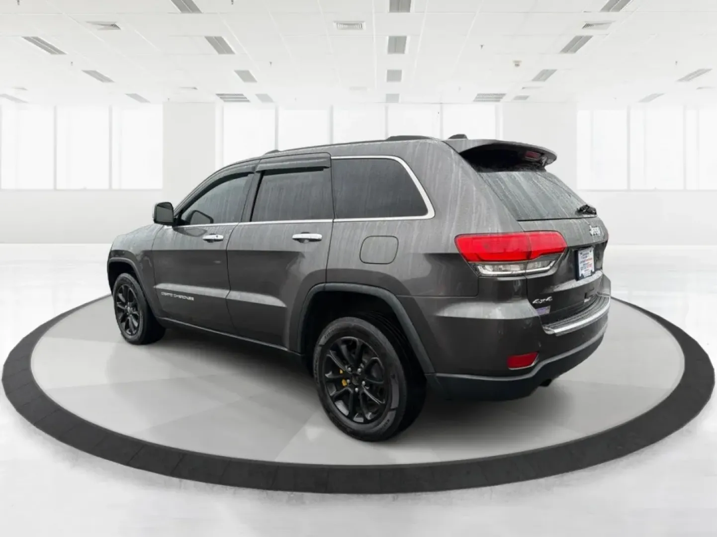 2014 Jeep Grand Cherokee Limited (1C4RJFBG9EC) with an Other engine, located at 880 E. National Road, Vandalia, OH, 45377, (937) 908-9800, 39.891918, -84.183594 - **Adventure Awaits: Drive Home a 2014 Jeep Grand Cherokee Limited Today!**<br /> <br /> Are you ready to elevate your driving experience? Picture yourself and your loved ones embarking on weekend getaways or daily commutes in the rugged yet refined 2014 Jeep Grand Cherokee Limited. This SUV isn't ju - Photo#4