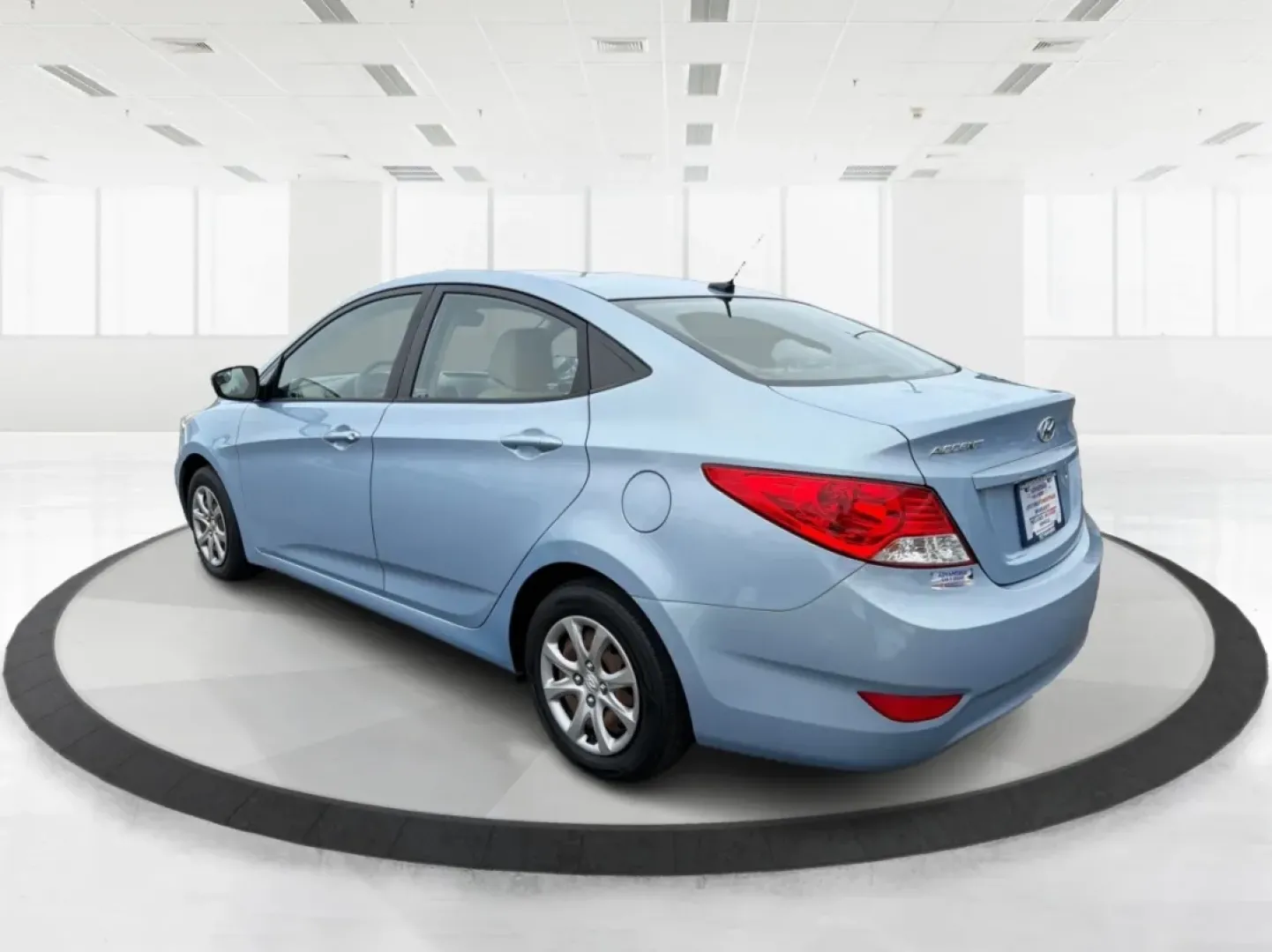 2014 Hyundai Accent GLS (KMHCT4AE6EU) with an 1.6L I-4 gasoline direct injection engine, located at 4508 South Dixie Dr, Moraine, OH, 45439, (937) 908-9800, 39.689976, -84.218452 - Discover the perfect blend of reliability and style with the 2014 Hyundai Accent GLS, an exceptional sedan ideally suited for budget-conscious buyers and those embarking on new journeys. Whether you're navigating the bustling streets of Moraine, OH, or taking a scenic drive through nearby Dayton, th - Photo#4