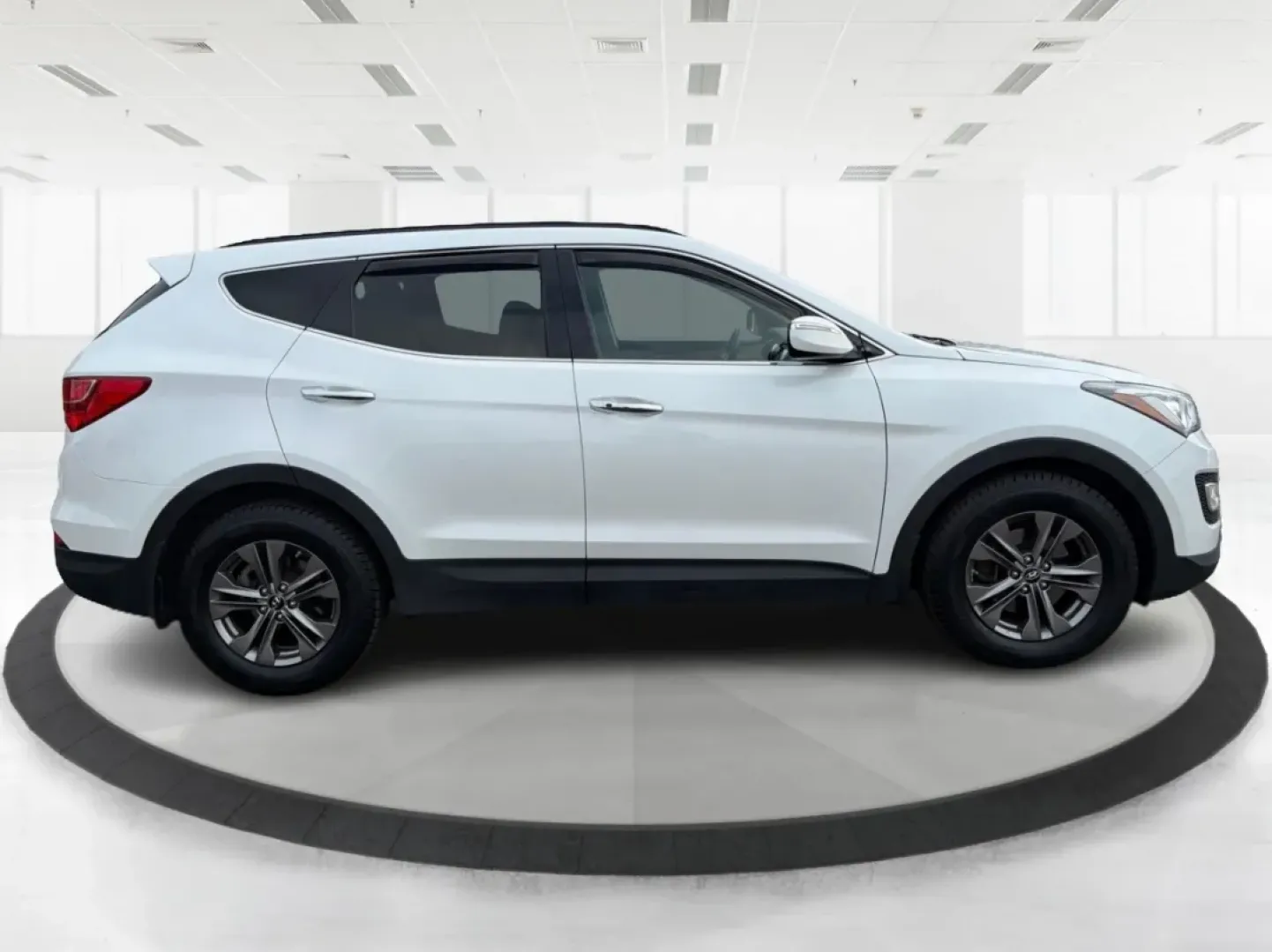 2014 Hyundai Santa Fe 2.4L (5XYZUDLB7EG) with an Theta II 2.4L I-4 gasoline direct injection engine, located at 1099 N County Rd 25A, Troy, OH, 45373, (937) 908-9800, 40.057079, -84.212883 - **Explore the Open Road with Ease: 2014 Hyundai Santa Fe at Advantage Car and Credit - Troy**<br /> <br /> Are you ready to take your family adventures to the next level? The 2014 Hyundai Santa Fe is designed for those seeking comfort, style, and ample space for everything life throws your way-perfe - Photo#1