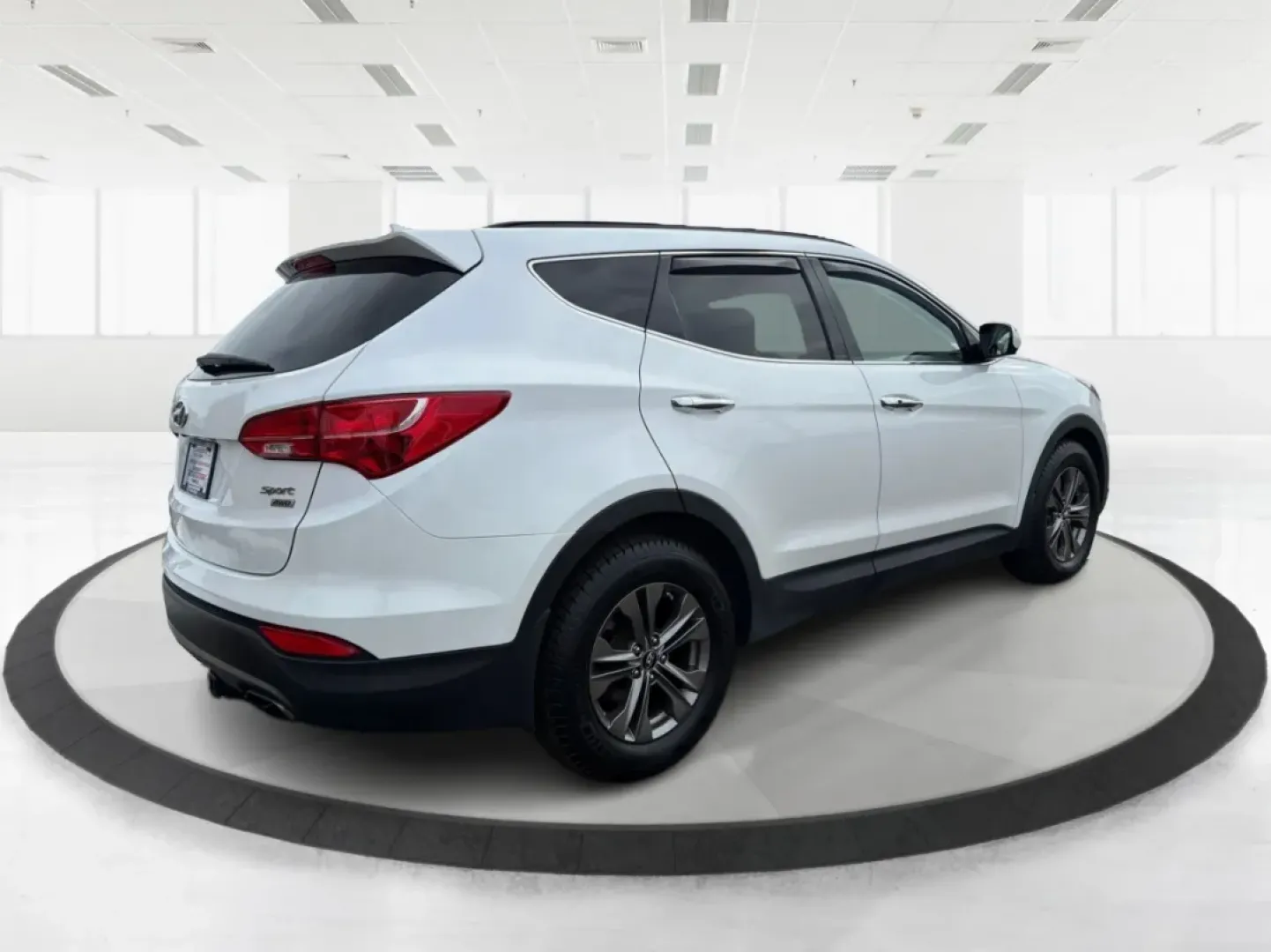 2014 Hyundai Santa Fe 2.4L (5XYZUDLB7EG) with an Theta II 2.4L I-4 gasoline direct injection engine, located at 1099 N County Rd 25A, Troy, OH, 45373, (937) 908-9800, 40.057079, -84.212883 - **Explore the Open Road with Ease: 2014 Hyundai Santa Fe at Advantage Car and Credit - Troy**<br /> <br /> Are you ready to take your family adventures to the next level? The 2014 Hyundai Santa Fe is designed for those seeking comfort, style, and ample space for everything life throws your way-perfe - Photo#2