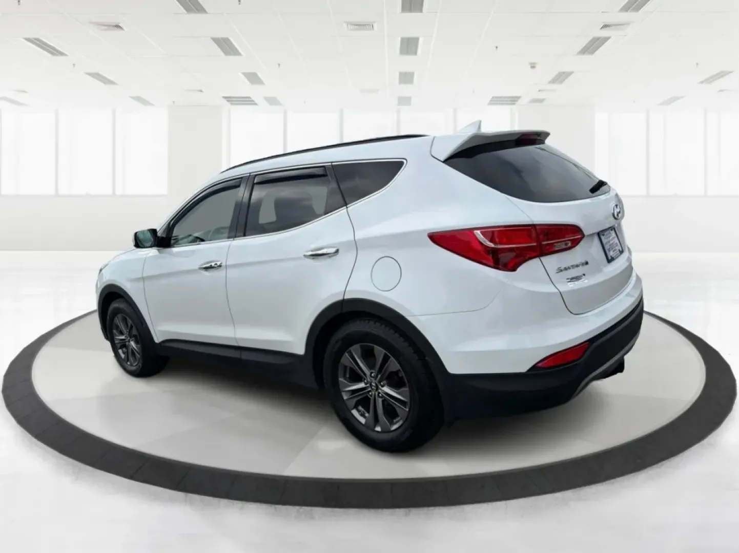 2014 Hyundai Santa Fe 2.4L (5XYZUDLB7EG) with an Theta II 2.4L I-4 gasoline direct injection engine, located at 1099 N County Rd 25A, Troy, OH, 45373, (937) 908-9800, 40.057079, -84.212883 - **Explore the Open Road with Ease: 2014 Hyundai Santa Fe at Advantage Car and Credit - Troy**<br /> <br /> Are you ready to take your family adventures to the next level? The 2014 Hyundai Santa Fe is designed for those seeking comfort, style, and ample space for everything life throws your way-perfe - Photo#4