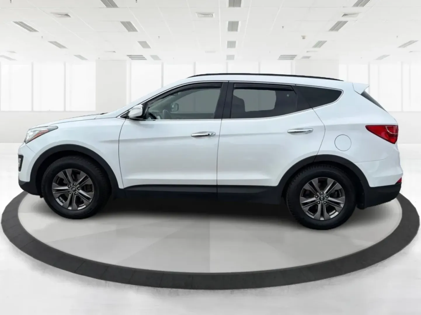 2014 Hyundai Santa Fe 2.4L (5XYZUDLB7EG) with an Theta II 2.4L I-4 gasoline direct injection engine, located at 1099 N County Rd 25A, Troy, OH, 45373, (937) 908-9800, 40.057079, -84.212883 - **Explore the Open Road with Ease: 2014 Hyundai Santa Fe at Advantage Car and Credit - Troy**<br /> <br /> Are you ready to take your family adventures to the next level? The 2014 Hyundai Santa Fe is designed for those seeking comfort, style, and ample space for everything life throws your way-perfe - Photo#5